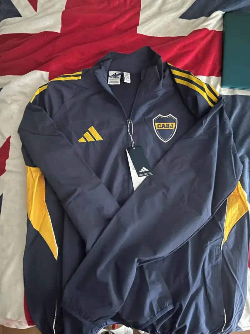 Chaqueta deportiva Adidas CABJ azul y amarilla