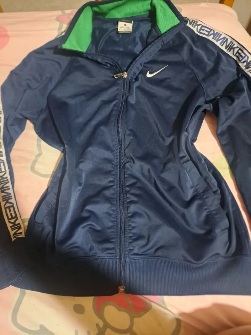 Chaqueta deportiva Nike azul con logo - 1