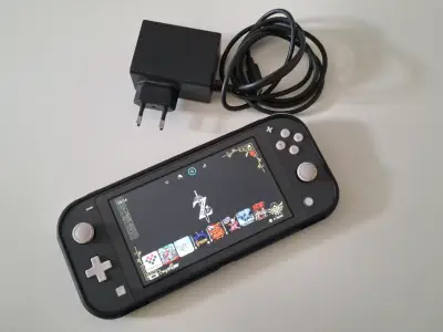 Nintendo Switch Lite con Magia 128gb - miniatura 1