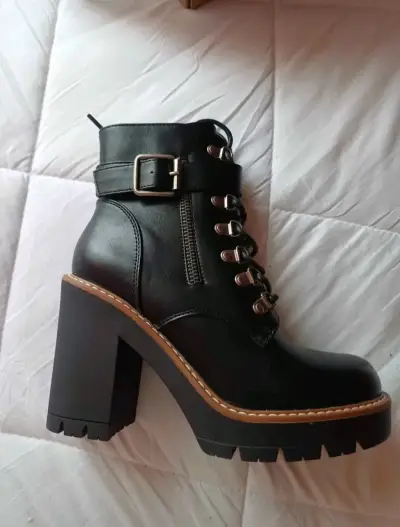 Botines de cuero negro con tacón alto - miniatura 1