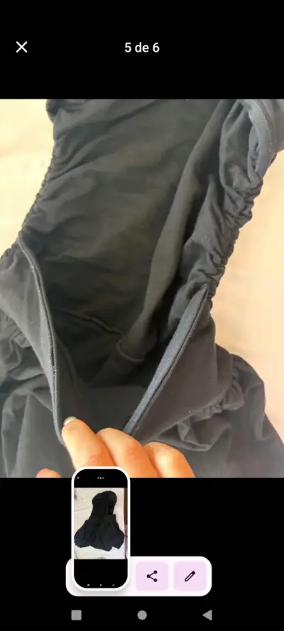 Vestido negro corto con diseño elegante - miniatura 2