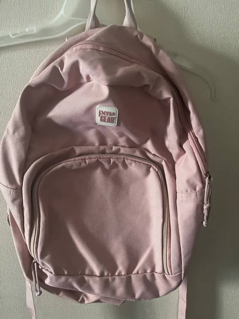 Mochila rosa Penny Gear en buen estado