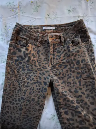 Pantalones flare animal print talla 38 - miniatura 1