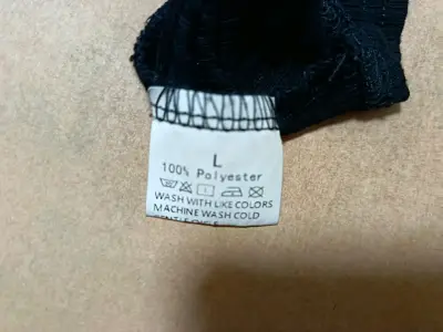 Top negro con mangas de tul transparente - miniatura 4