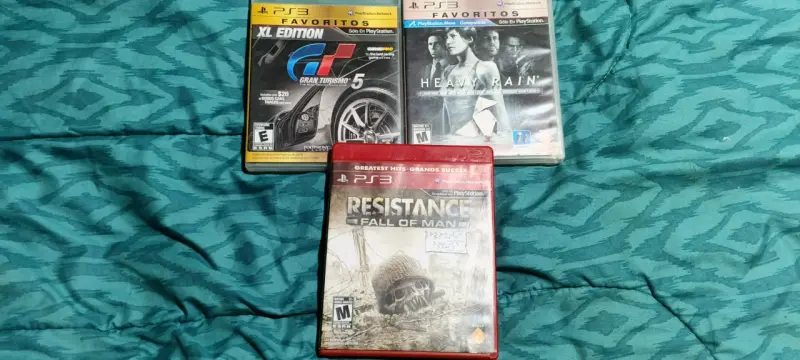 Juegos PS3 Resistance, Gran Turismo 5 y Heavy Rain - 4