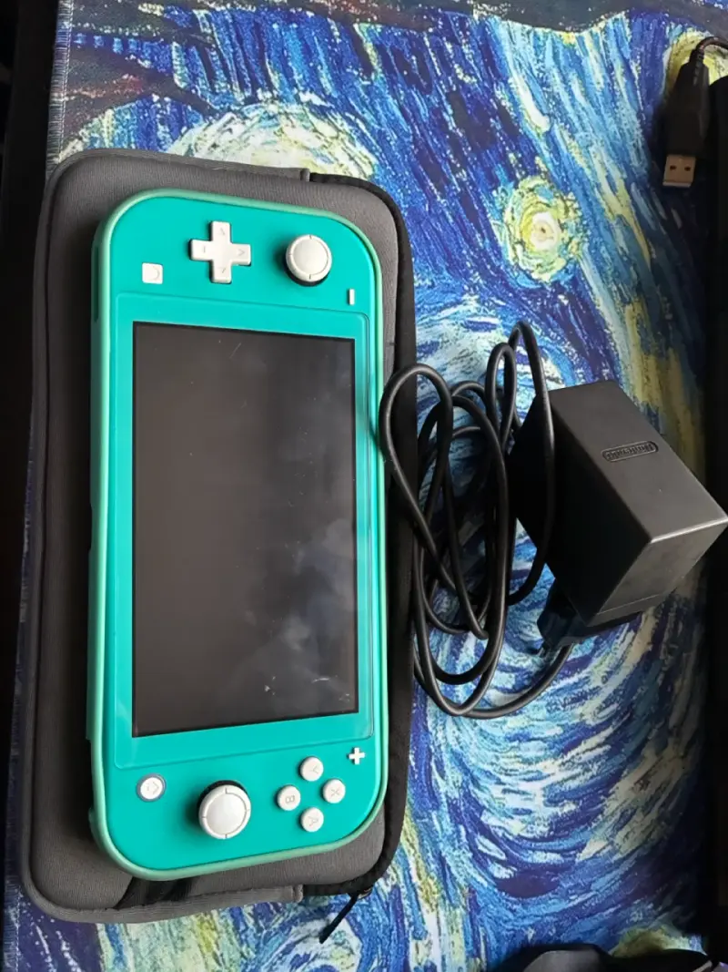 Nintendo Switch Lite turquesa con cargador - 1