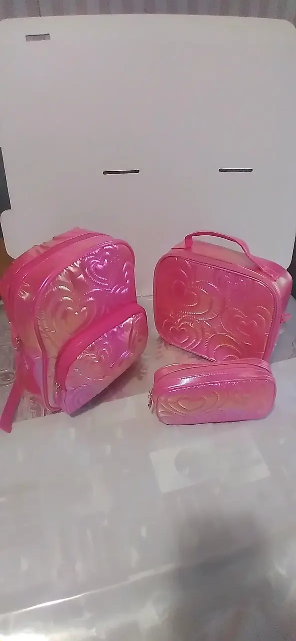 Set de mochilas y estuches rosados brillantes - 1