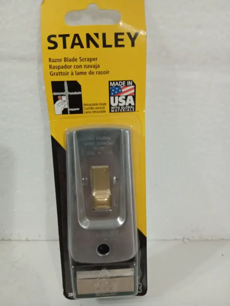 Raspador con Navaja Stanley Retráctil