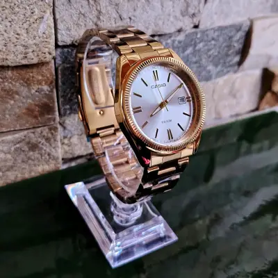 Reloj Casio dorado - miniatura 1