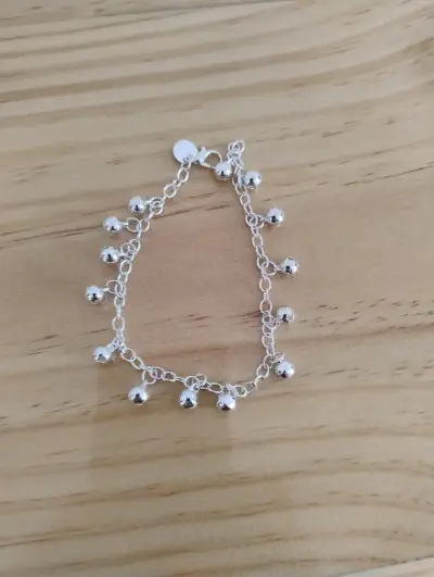 Pulsera de plata con finísimos cascabeles - miniatura 1