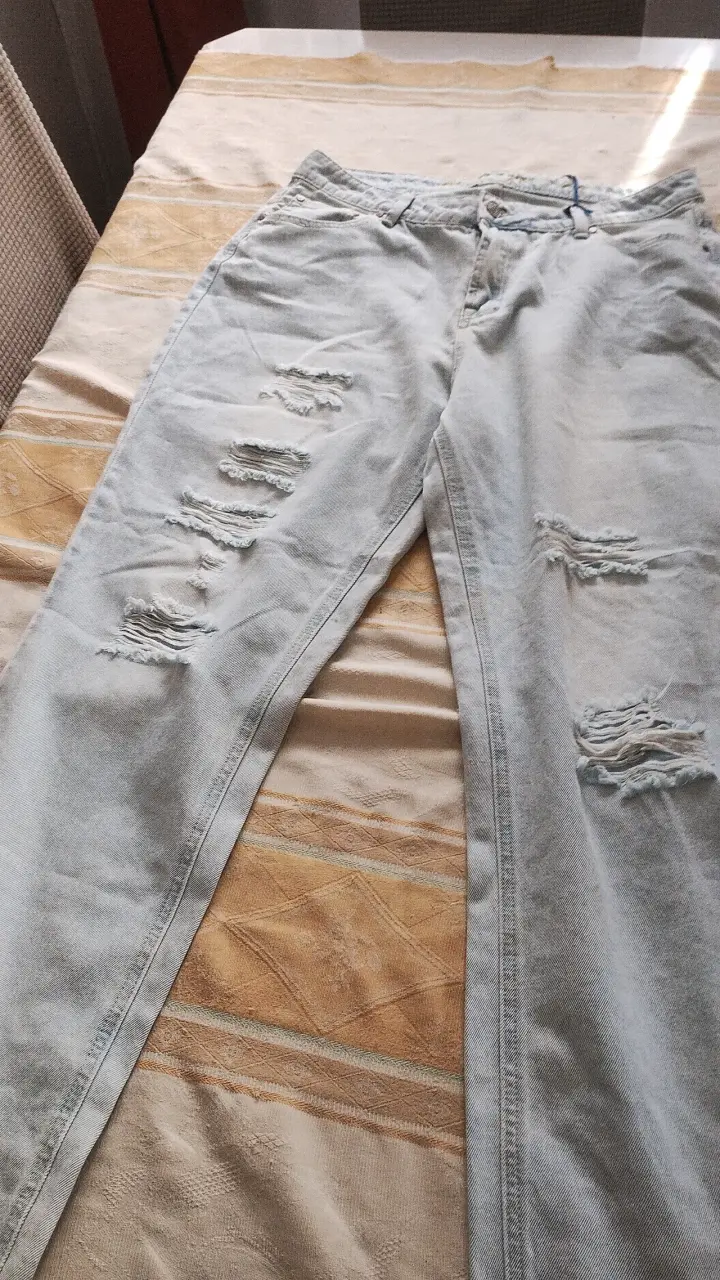 Jeans desgastados de mezclilla claros - 1