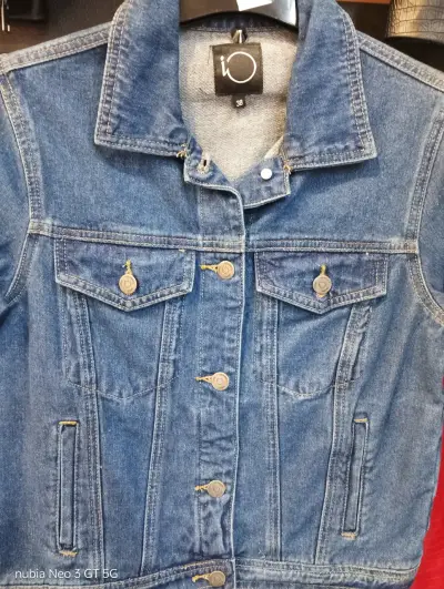 Chaqueta de mezclilla azul para mujer - miniatura 1