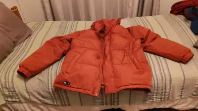 Chaqueta acolchada naranja para invierno - miniatura 2