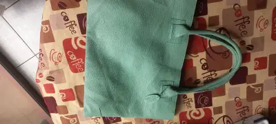 Bolso de mano verde menta con interior de lunares - miniatura 1