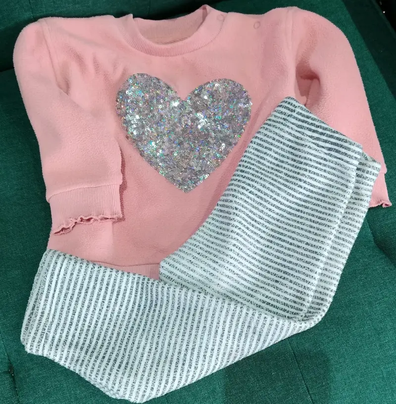 Conjunto de bebé rosado polar