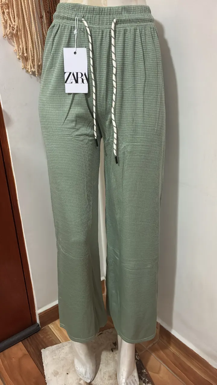 Pantalones acampanados negros con brillo - 4
