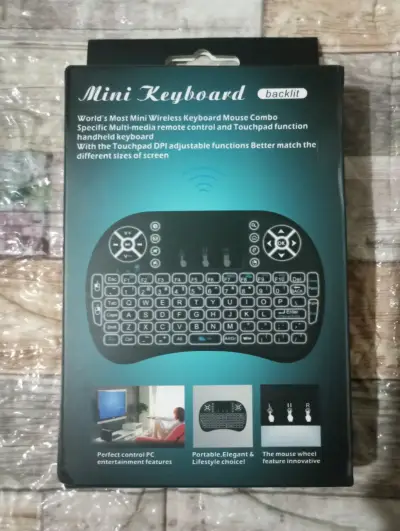 Mini teclado inalámbrico retroiluminado con touchpad - miniatura 1