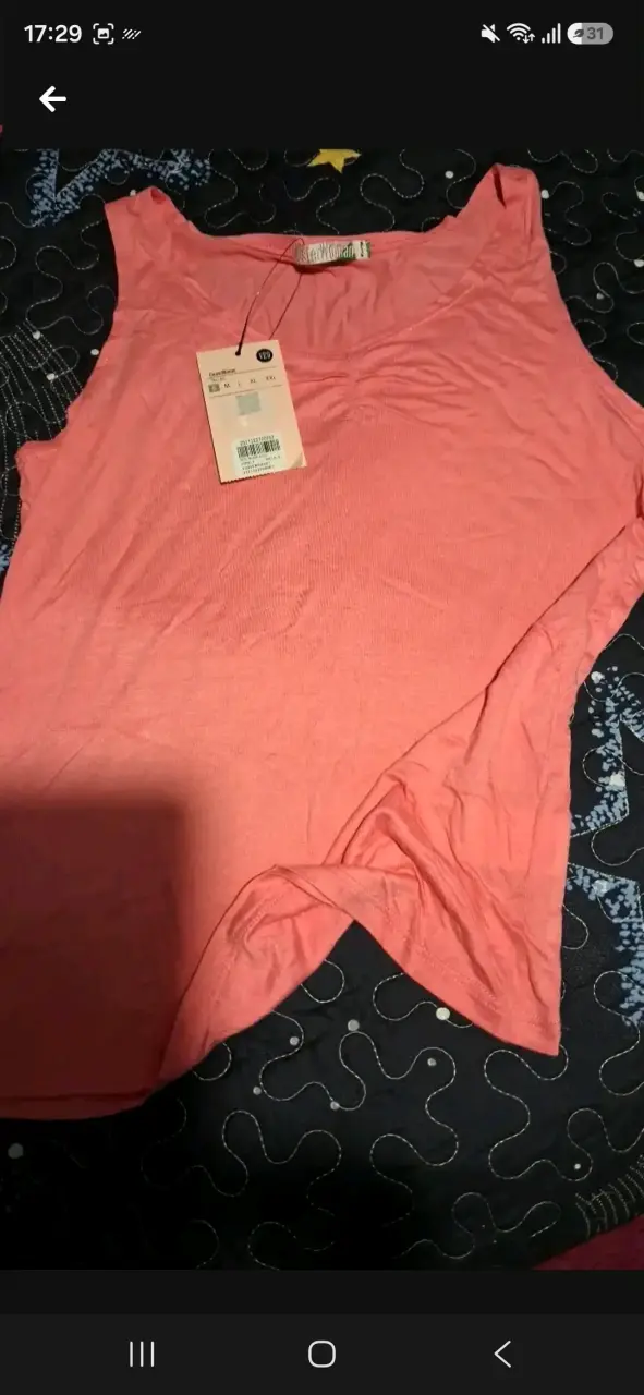 Polera sin mangas rosada para mujer