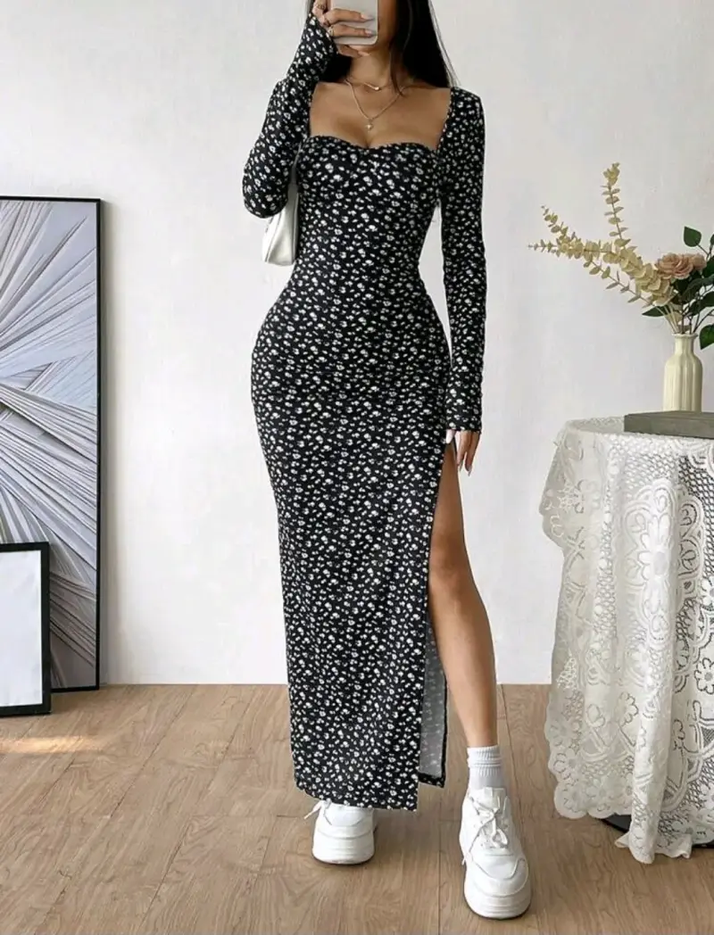 Vestido largo negro con estampado floral y abertura - 1