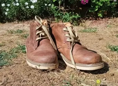 Botines de cuero marrón para hombre en buen estado - miniatura 1