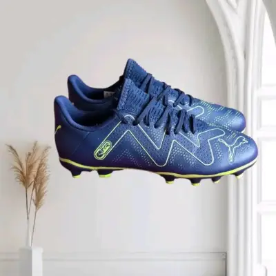 Botines de fútbol Puma azul con diseños verdes - miniatura 1