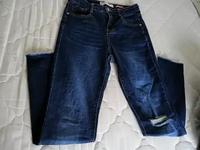 Jeans de mezclilla azul desgastados para niña - miniatura 1