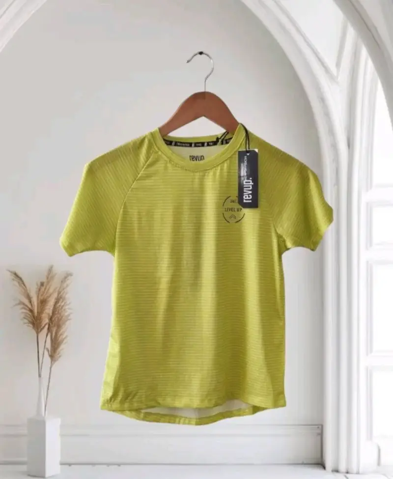 Polera deportiva amarilla para niño Revup