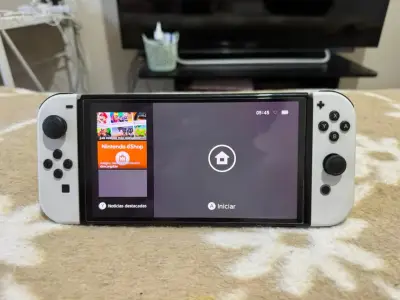 Consola Nintendo Switch OLED blanca en buen estado - miniatura 1