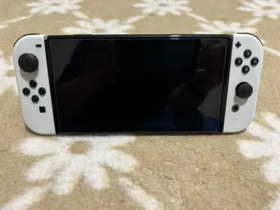 Consola Nintendo Switch OLED blanca en buen estado - miniatura 3