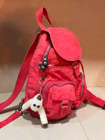 Mochila Kipling roja con múltiples bolsillos - miniatura 2