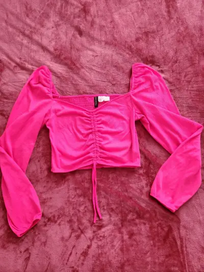 Blusa fucsia con mangas abullonadas - miniatura 1