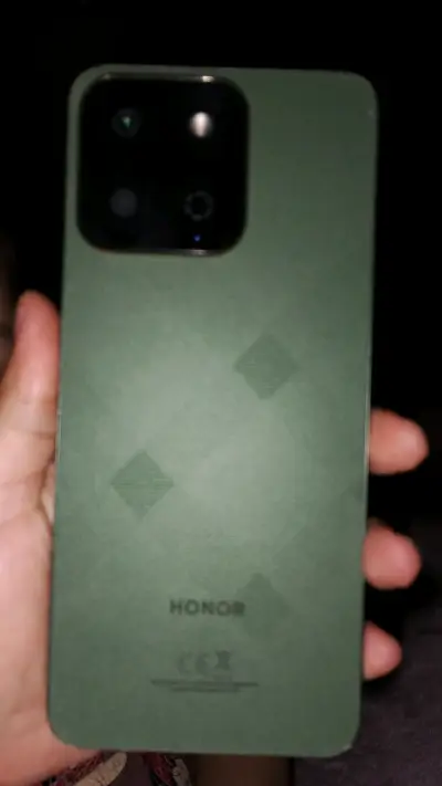 Smartphone Honor verde con cámara dual - miniatura 1