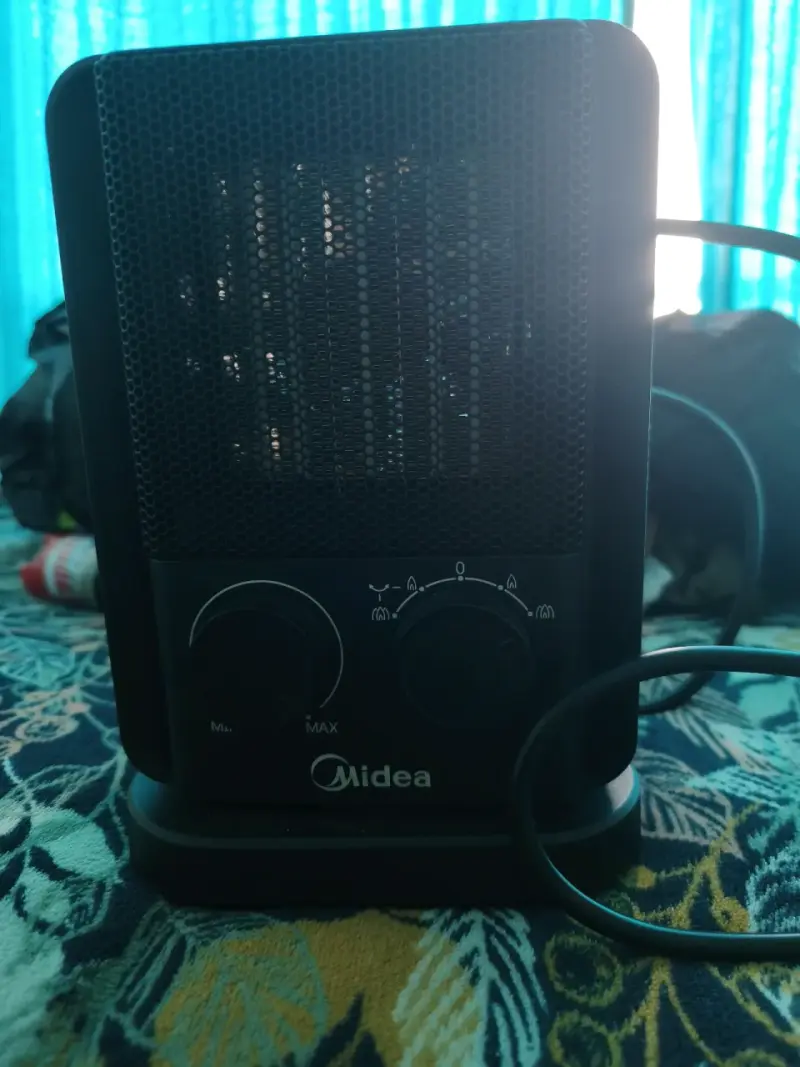 Calefactor eléctrico Midea compacto - 1