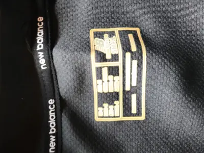 Chaqueta deportiva New Balance verde y negra - miniatura 3