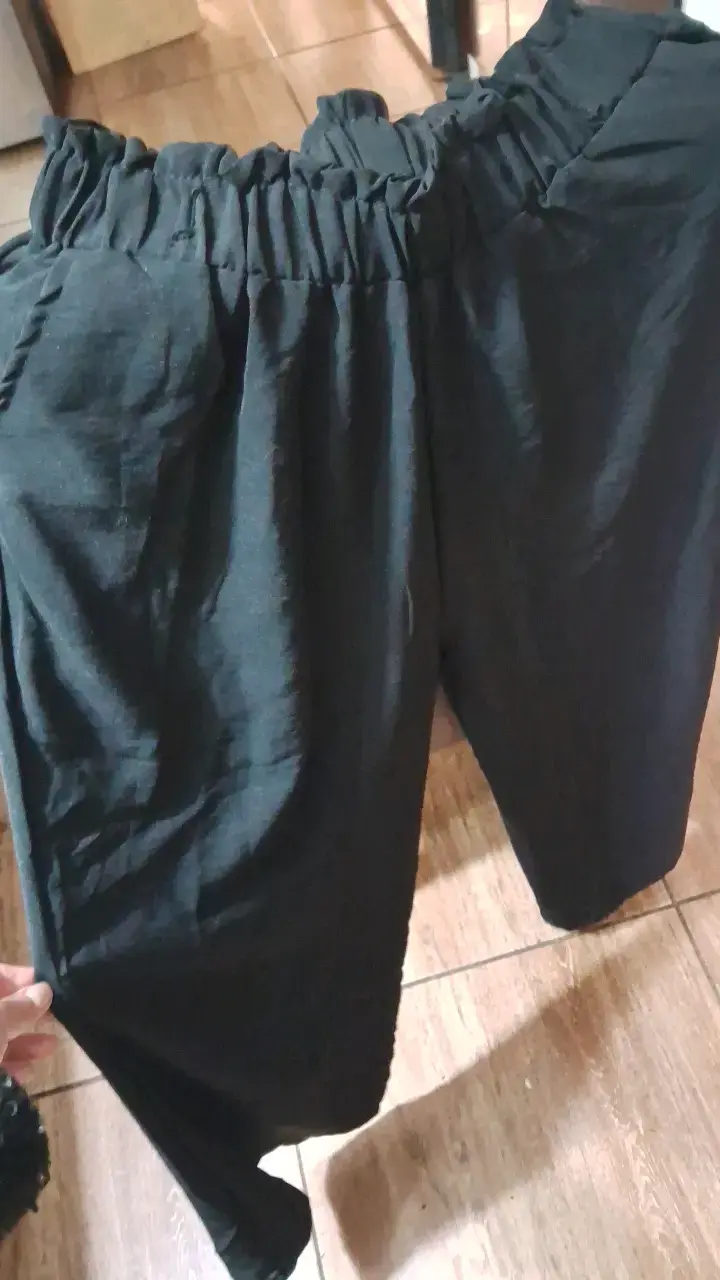 Pantalones negros de tiro alto para mujer