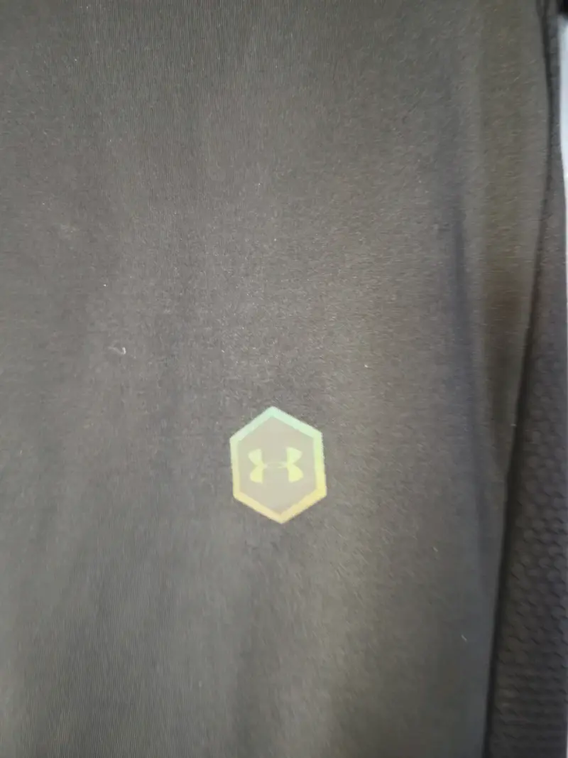 Polera deportiva negra Under Armour Rush - 6