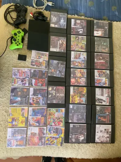 Consola PlayStation 2 con juegos y controles - miniatura 1