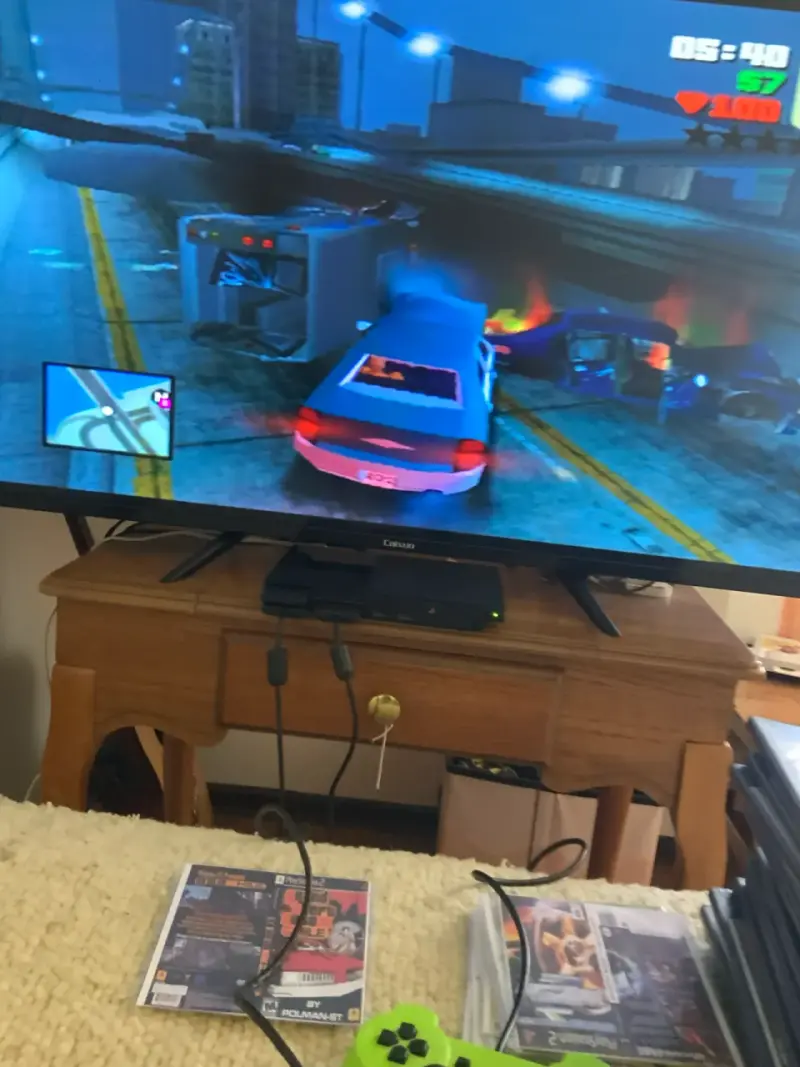 Consola PlayStation 2 con juegos y controles - 2