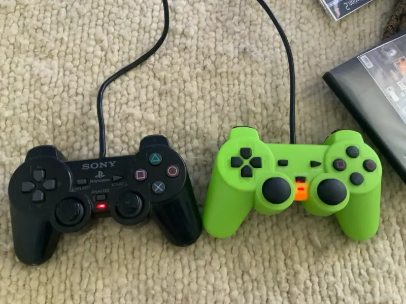 Consola PlayStation 2 con juegos y controles - 4