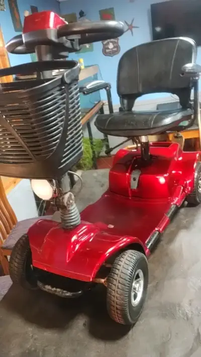 Scooter eléctrico rojo para movilidad reducida - miniatura 1