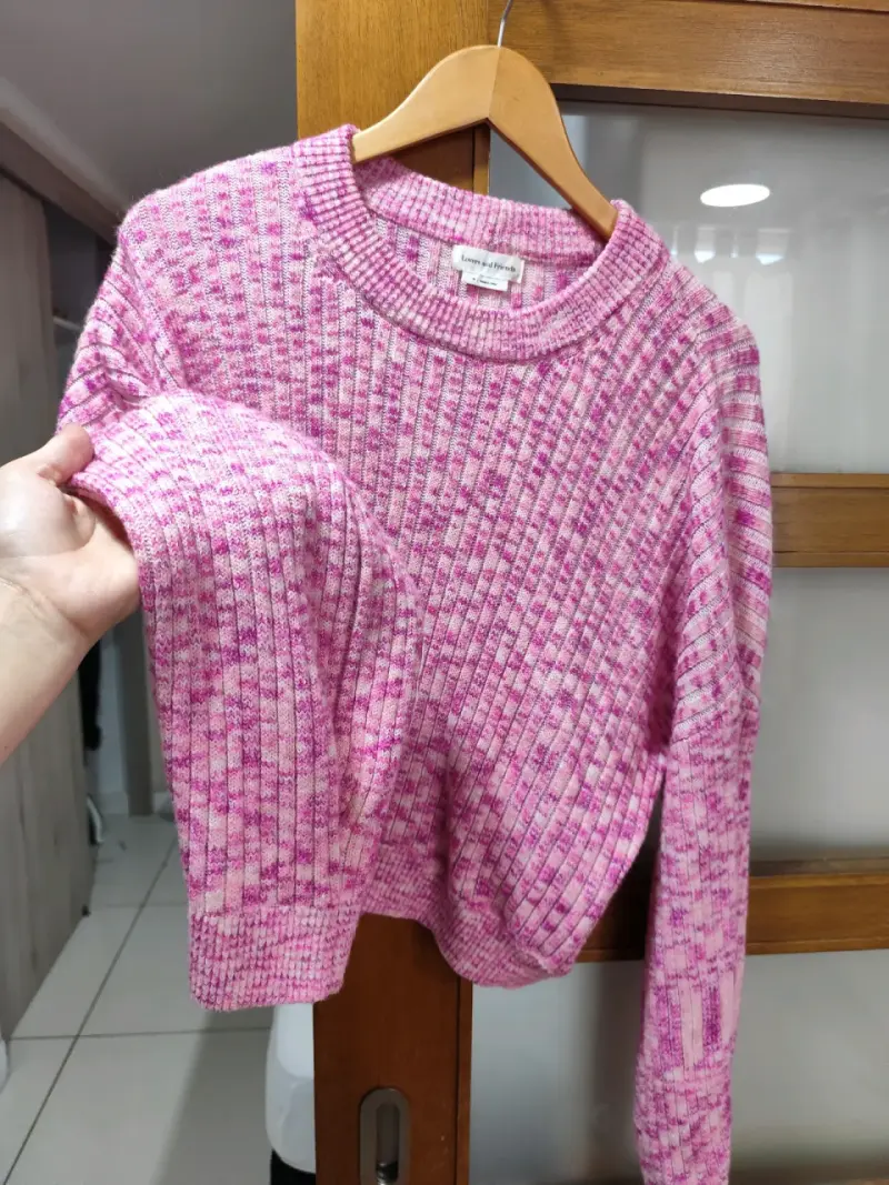 Suéter rosado de punto para mujer