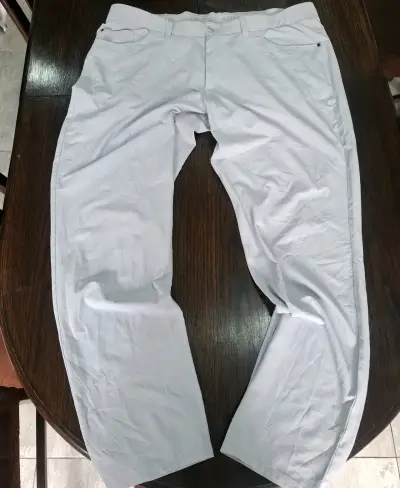 Pantalones blancos Under Armour para hombre - miniatura 1