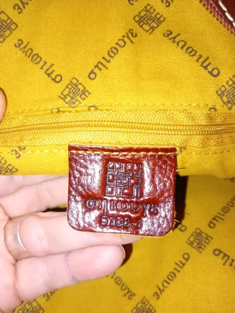 Mochila de cuero marrón con múltiples bolsillos - 4