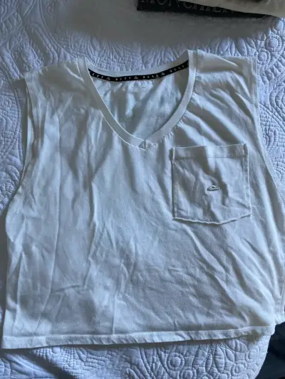 Polera sin mangas blanca Reef con diseño - miniatura 1