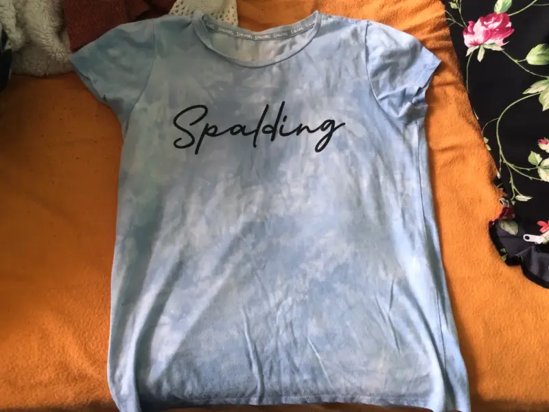 Polera azul Spalding para mujer