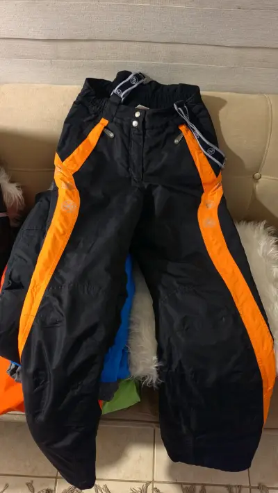 Pantalones de esquí negros con detalles naranjas - miniatura 1