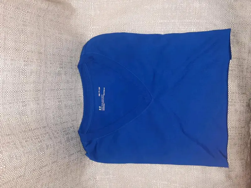 Polera azul Under Armour para hombre