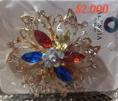 Broche de bisutería con piedras de colores - miniatura 2