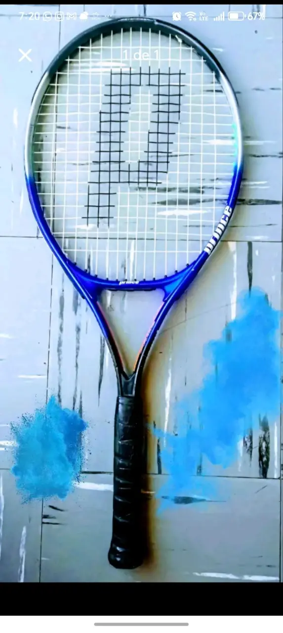 Raqueta de tenis Prince azul en buen estado