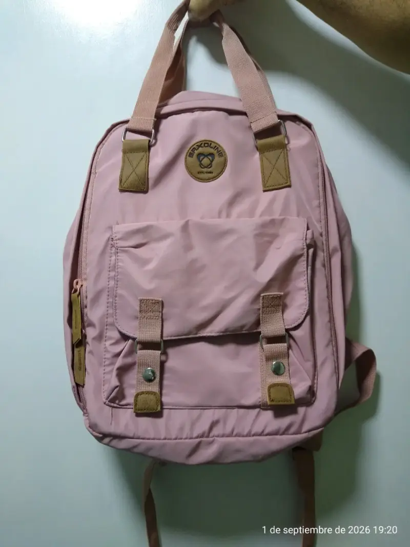 Mochila rosa Saxoline con bolsillos frontales - 1